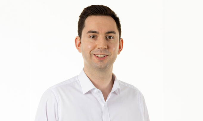 Eliot passes flagship exam to achieve chartered status